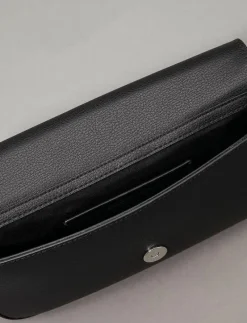 MINIMAL MONOGRAM SHOULDER POUCH - Axelremsväskor