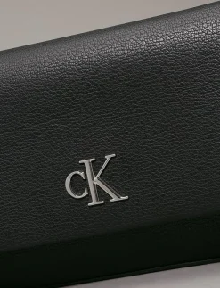 MINIMAL MONOGRAM SHOULDER POUCH - Axelremsväskor