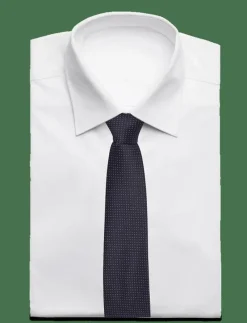 Polyester tie with dots 7 cmPolyester tie with dots 7 cm - Slipsar