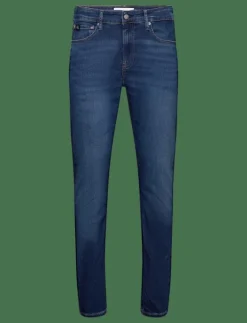 SLIM TAPER - Slim jeans